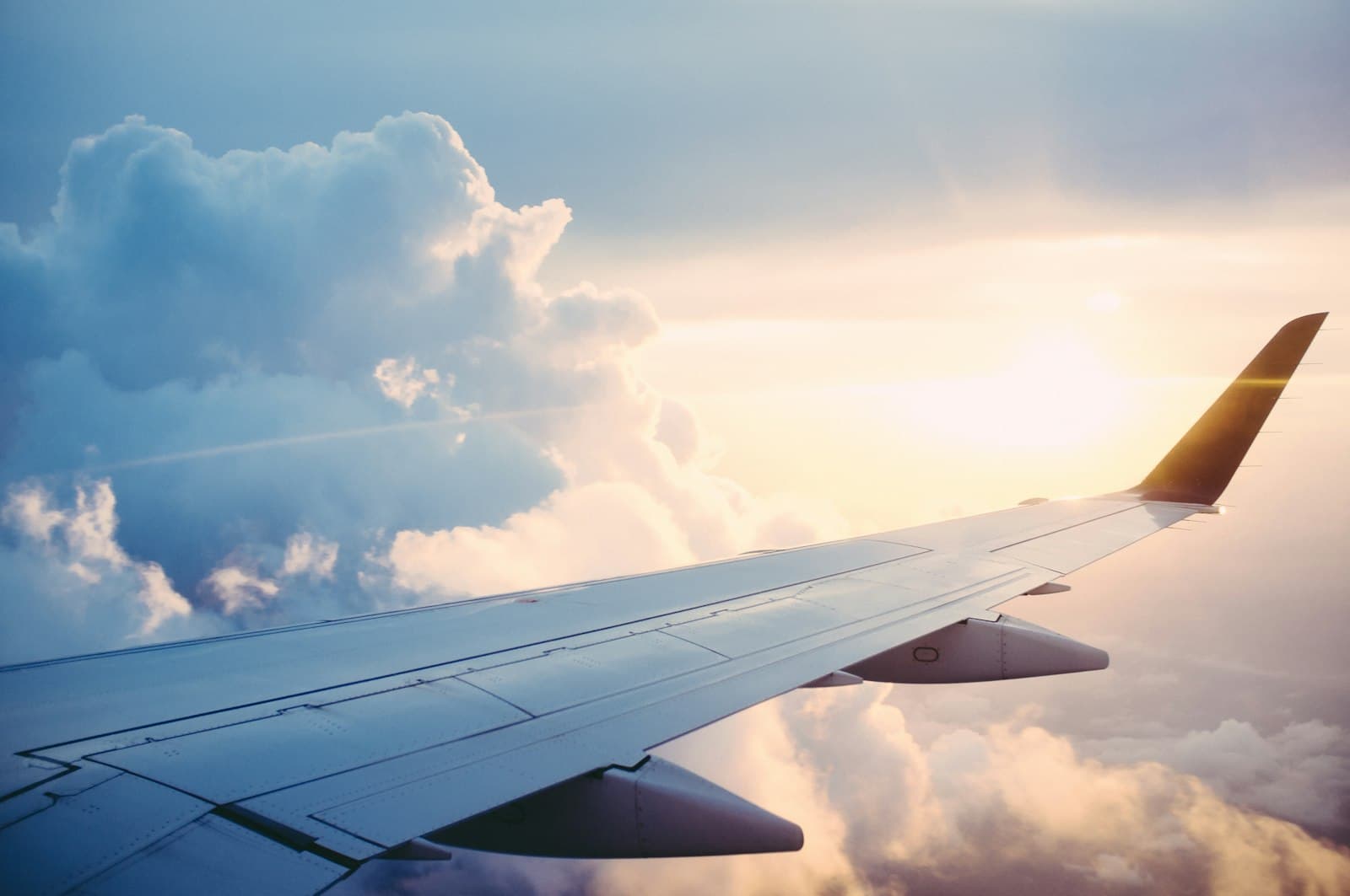 Aircraft wing above the clouds